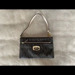 Michael Kors wristlet bag.